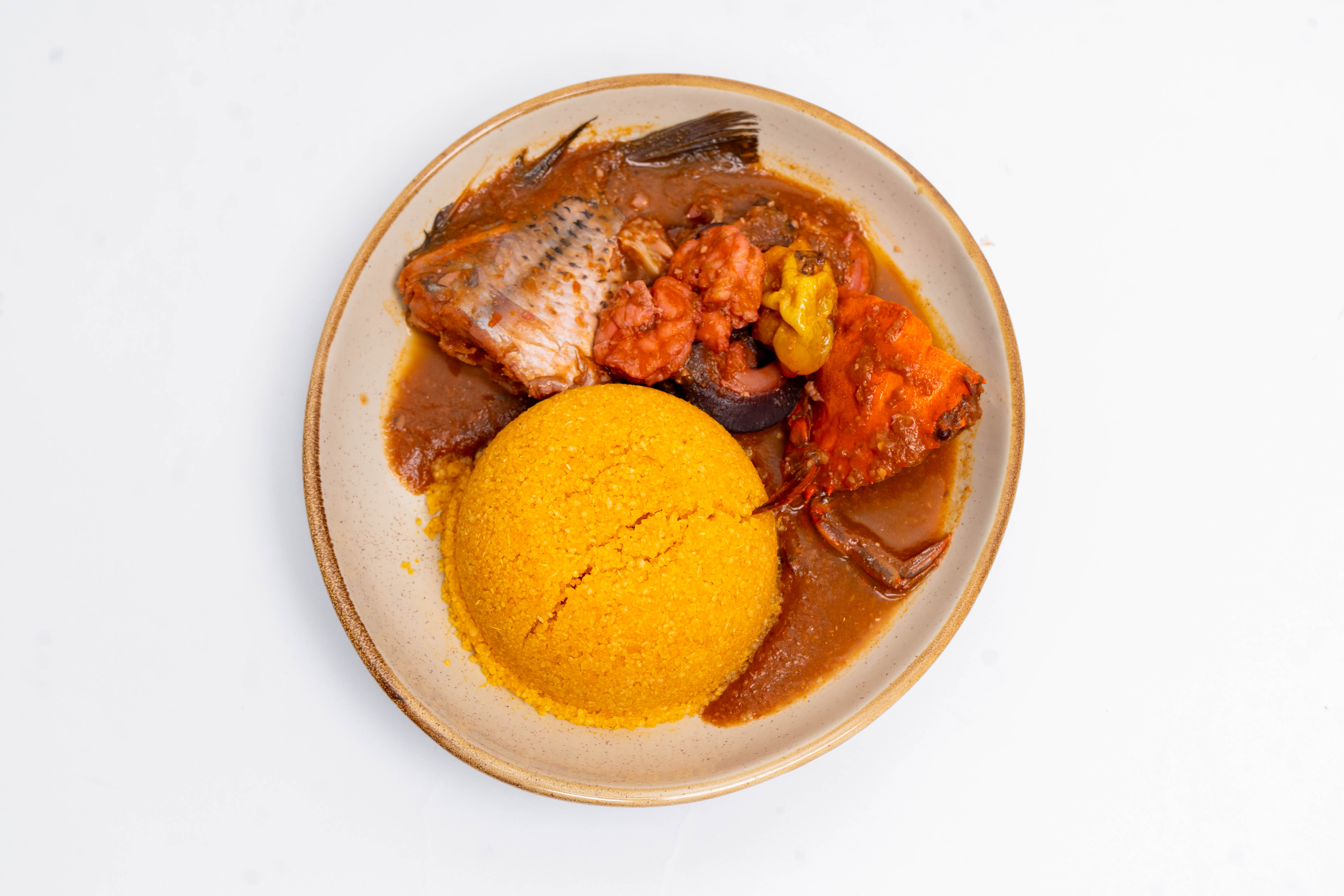 Soupe du pêcheur + attiéké huile rouge