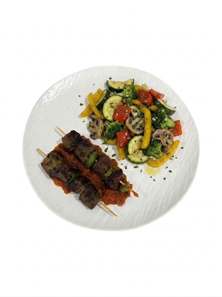 Brochette de boeuf, légumes sauté